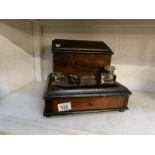 An Edwardian ink stand with stationary box and drawer,