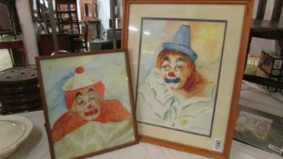 2 clown paintings