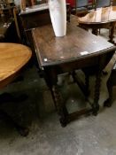 An oak barley twist gateleg table