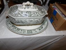 A large soup tureen on stand