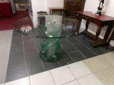 A heavy glass dining table