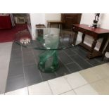 A heavy glass dining table
