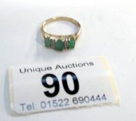 A gold ring set 3 emeralds,