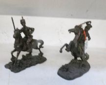 2 figures of soldiers on horse back