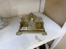 A ornate brass inkstand