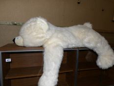 A large polar bear soft toy