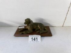 A spelter spaniel with bronzed finish