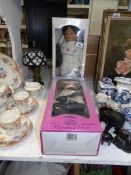 2 boxed porcelain collectors dolls