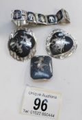 A Siamese silver bracelet and 3 brooches