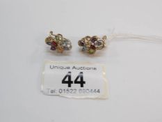 A pair of 9ct gold earrings set multi gems