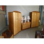 A 1960's birds eye maple bedroom suite comprising 2 wardrobes, dressing table,