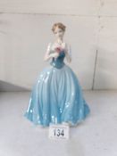 A Coalport figurine 'Dearest Rose',