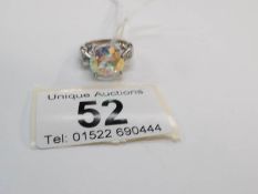 A white gold ring set irredescant topaz,