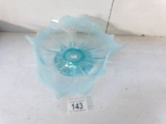 An Edwardian blue vaseline glass crimped dish