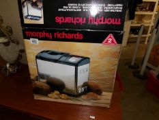 A boxed Morphy Richards bread maker