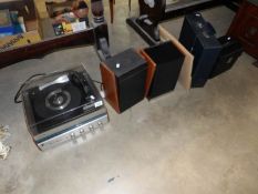 A record player and 2 cases of records
