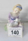 A Royal Doulton figurine 'Mary Had a Little Lamb',