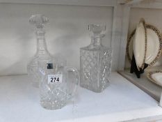 A Rockingham crystal tankard and 2 cut glass decanters
