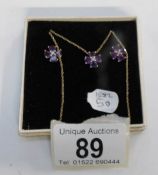 A pair of amethyst and diamond earrings and pendant on gold chain