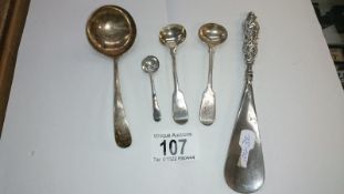 A silver ladle, silver handled shoe horn and 2 silver salt/mustard spoons