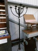 A large iron candle stand