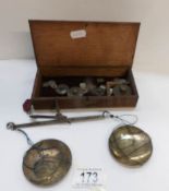 A set of precious metal scales and weights