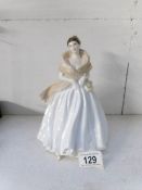 A Coalport figurine 'Millennium Celebration',