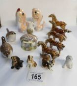 A mixed lot including fish salt and pepper pots,