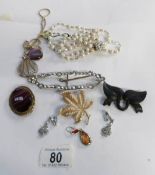 A small selection of costume jewellery including Sarah Coventry, Monet,