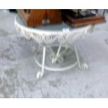 A wrought iron glass topped table