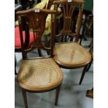 Pair of French Walnut Side Chairs, with gilt metal mounts, bergere covered seat, on turned front