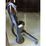 Metal hand water pump, 19”h, painted black.