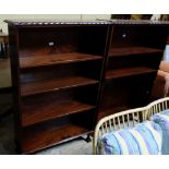 Matching Pair of modern Mahogany Floor Bookcases, each with 4 adjustable shelves, on ball and claw