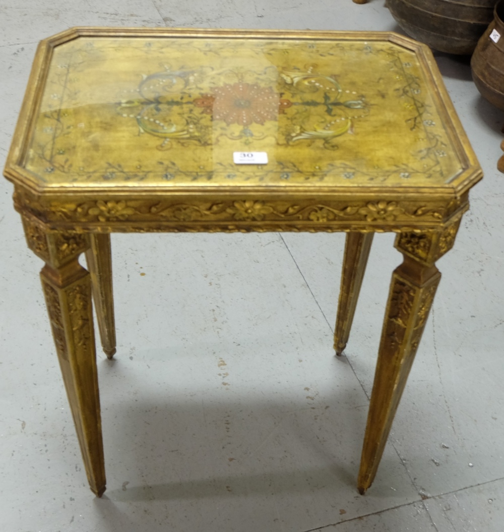 19thC French Gilt Side Table, the painted glass covered top over a craved frieze and carved legs,