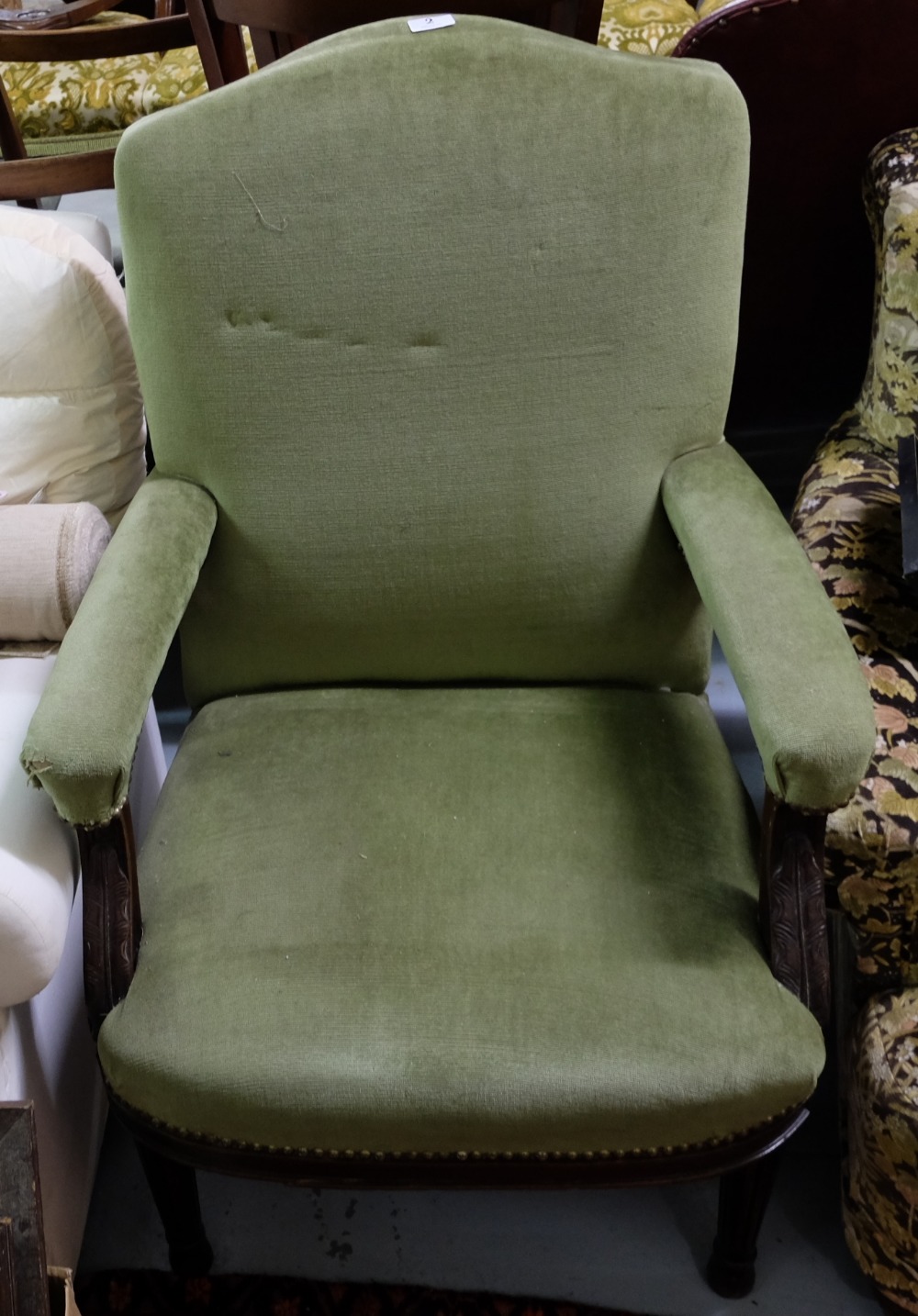 Early 20thC Walnut Armchair, with armrests, green fabric upholstery.