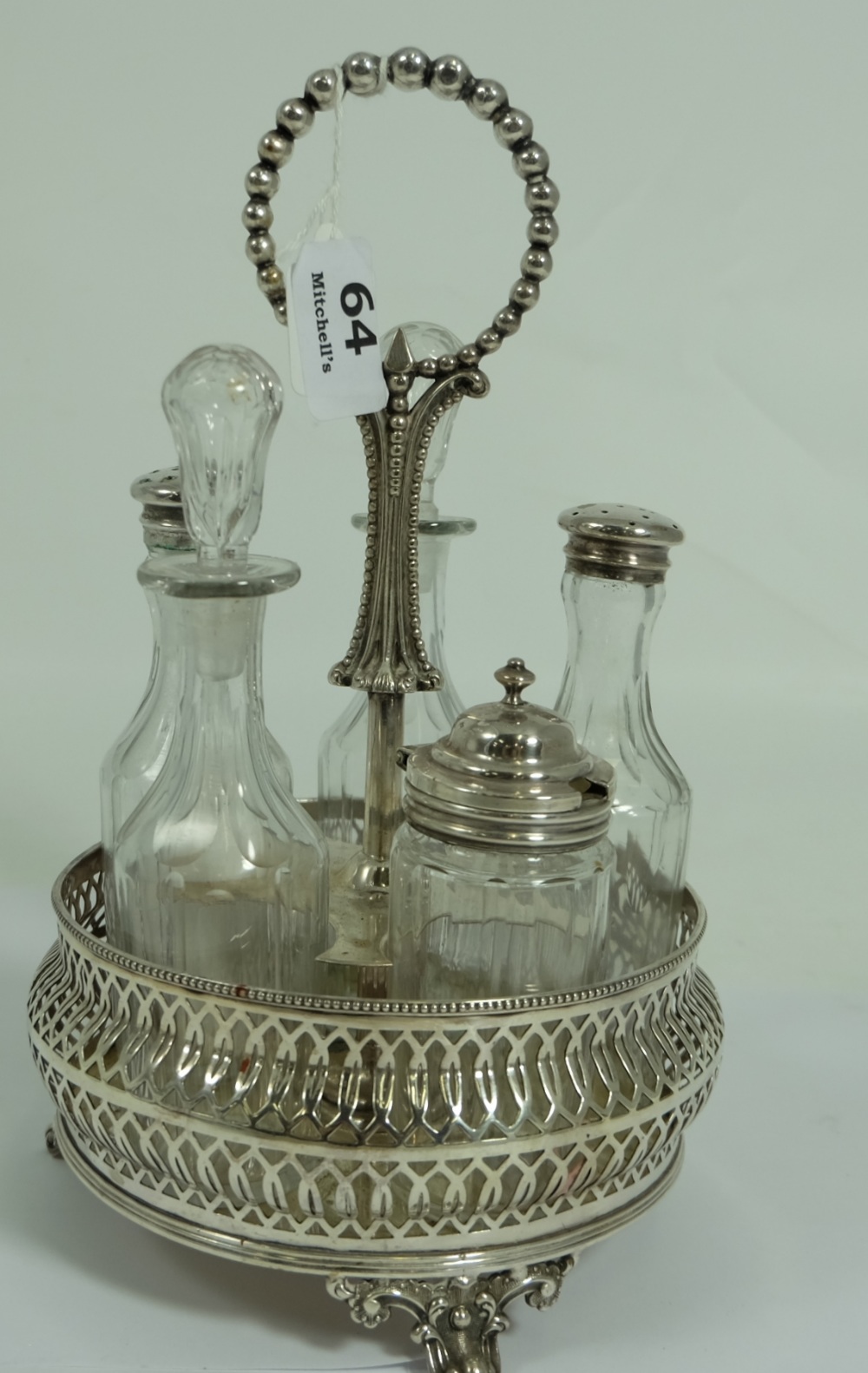 5 Piece Edwardian Cruet Set, in plated stand.