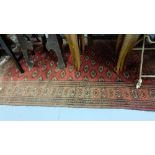 Persian Baccara Design Floor Rug, red ground with beige inserts, 61” x 40”.