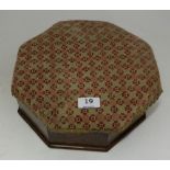 Victorian octagonal shaped foot warmer, with padded seat, needlepoint cover.