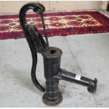 Metal hand water pump, 19”h, painted black.