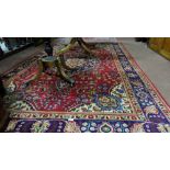 Fine quality hand woven Persian Tabriz, red ground with central medallion and navy and red