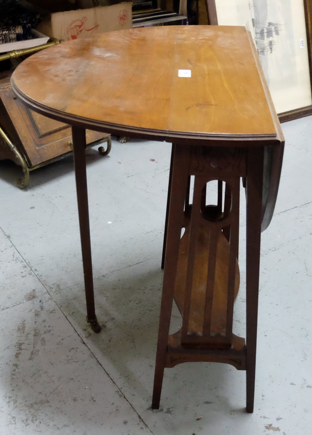 Arts & Crafts Walnut Sutherland Table, with oval ends, on tapered legs. 25”w, opens to 30”d.