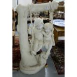 Italian White Marble Garden Figure – young boy and girl sitting on a swing, extending from a tree