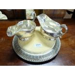 Matching Pair of Silver Plate Walker & Hall Sauceboats & cheese board with plated surround.