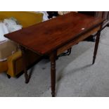 Rectangular mahogany side table, on turned & reeded legs, brass castors, 48”w x 21.5”h