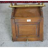 Arts and Crafts Walnut Coal Scuttle, with brass hinged panelled door, brass carrying handle and