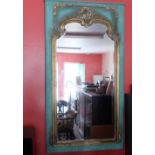 Empire Style Wall Mirror, on a painted green back with ornate gold panelled borders, bevelled glass,