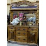 Edw. Walnut Sideboard with bevelled Mirror Back, the base fitted with 5 drawers and 2 cabinets –