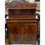 Victorian mahogany Chiffonier, the raised scrolled gallery with shelf over a shelf and two door