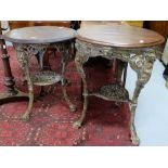 Similar pair of Victorian Metal Pub Tables, with circular mahogany tops, with female and lion masks,