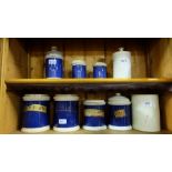 9 Victorian Ceramic Chemists Jars, some with lids (2 cream and 7 blue ground), some with labels,